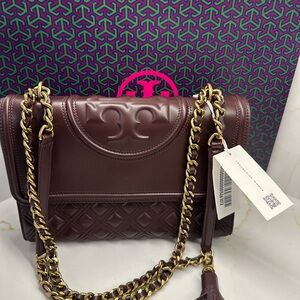 Tory burch burgundy/brown shoulder bag slightly damaged see pictures 175$